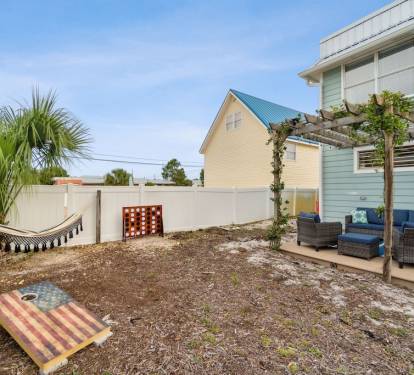 Enjoy the outdoor seating or relax in the hammock after a day at the beach. If you are in the mood for a challenge, there is a giant connect four game and corn hole boards.