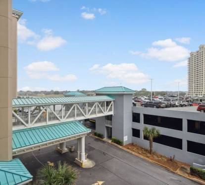Covered parking garage offers convenient access & peace of mind during your stay.