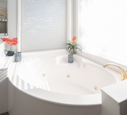 Clean bathroom w/ a sink and simple finishes for a fresh start.