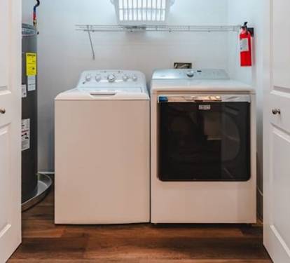Convenient Large Capacity Washer and Dryer Off of SeaScape's Kitchen