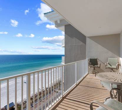 Balcony view overlooking the water, perfect for fresh air & quiet moments.