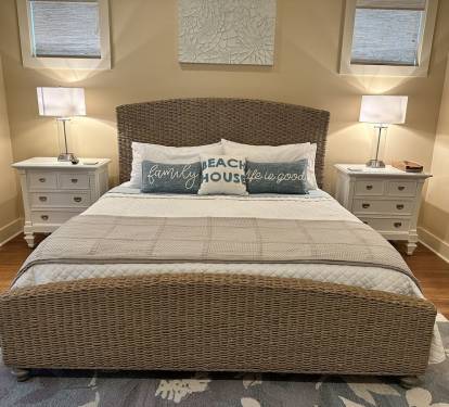 Master Bedroom #1 features cool coastal vibe w KING seagrass bed, comfy bedding.