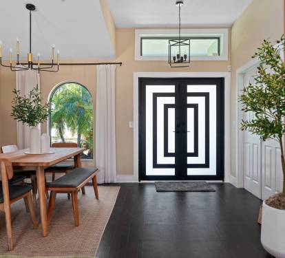 Elegant dining area designed for memorable meals. This warm and inviting space, filled with natural light and stylish decor, offers the perfect atmosphere for gatherings.