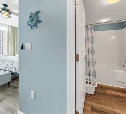 Convenient bathroom setup just off the bedroom, offering privacy & easy accessConvenient bathroom setup just off the bedroom, offering privacy & easy access