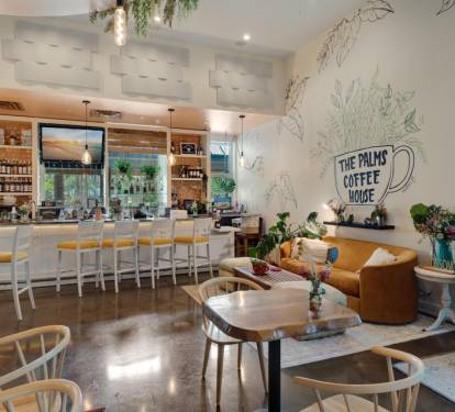 On-site coffee shop setup w/ counter seating for easy mornings.
