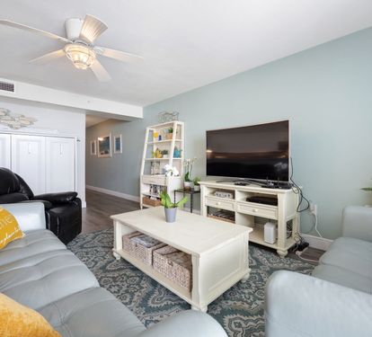 ??? "Relax in Style. The living area features two comfortable leather couches, a recliner, and a large smart TV—perfect for movie nights, cozy conversations, or simply unwinding after a day at