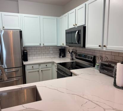 Appliances and countertops all new as of 2026. Toaster oven, coffee maker, Keurig, and all the pots, pans, and utensils you could possibly need.