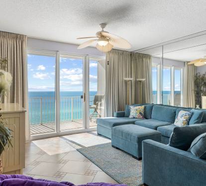 Sun-filled living room w/ plush sofas & space to unwind after beach days.