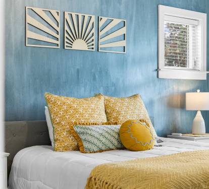 Wake up each day in a sunshine state of mind in the spacious master bedroom!