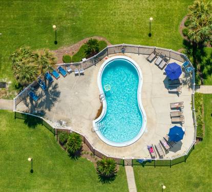 Sparking pool with ocean views!  Pool and the Gulf can be seen from the condo!