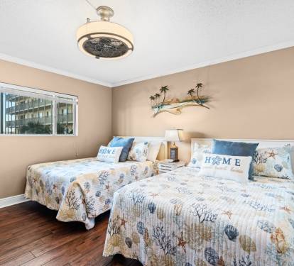 Guest bedroom with two full beds