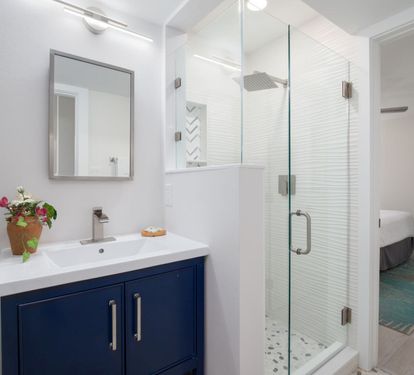 "Fresh, modern, and stylish! The guest bathroom features a chic design with a walk-in glass shower and vibrant accents, offering both comfort and elegance during your stay. ???? #VacationStyle #CoastalComfort"