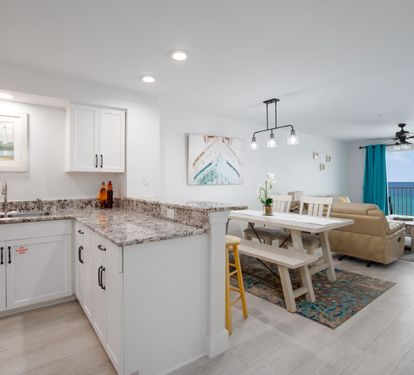 "Gather together in this open-concept space where the kitchen meets the dining and living areas, all with stunning Gulf views. ?????? #CoastalLiving #FamilyTimeByTheSea"