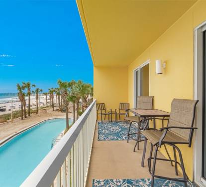 Balcony with hightop table and chairs