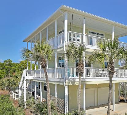 House exterior from street; plenty of parking on driveway(4-5 cars) & private street(2-3)