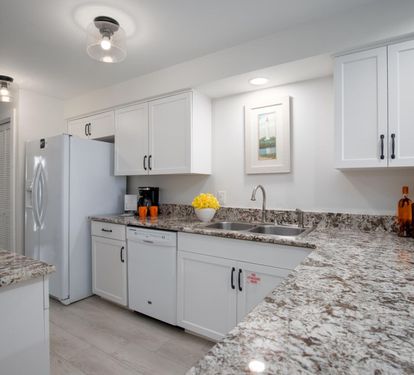 "Whip up your favorite meals in this bright and fully-equipped kitchen, featuring granite countertops and modern appliances. ??? #BeachsideCooking #VacationEats"