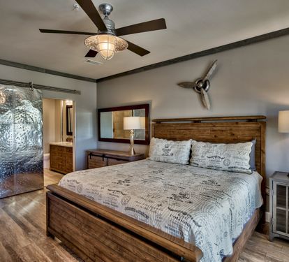 Master King Bedroom with Balcony access and en suite bath