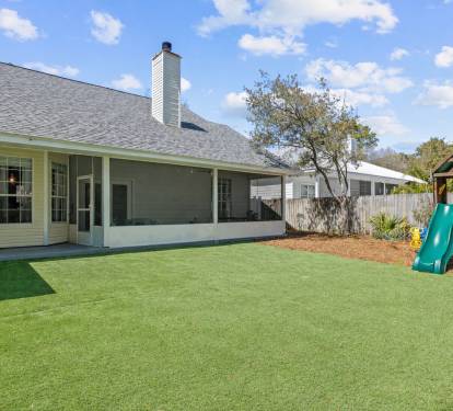 Fully fenced and full of fun- kids love the play set, and you'll love the worry free turf yard. Great space for the furry friends to play.