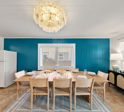Pull up a chair! The dining table seats 10 under a sparkling chandelier, making family dinners, birthday toasts, and
late-night card games feel like the main event. We didn't forget about the little ones! A high-chair and booster seat are also provided!