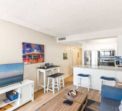 Comfortable seating and coastal details create a stylish and relaxing retreat.