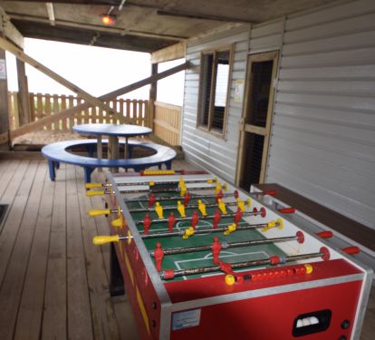 foosball table in one of the game rooms