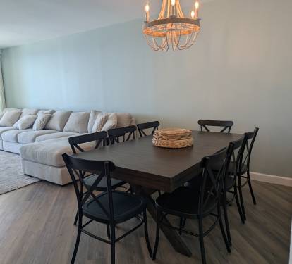 Dining with perspective relative to living room