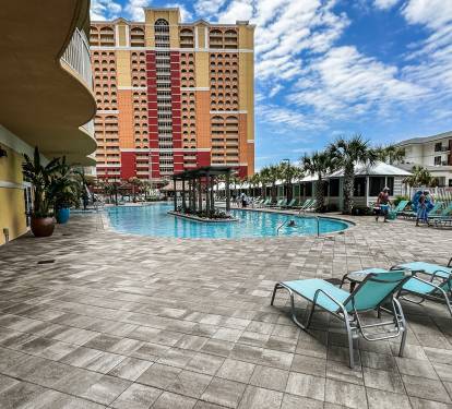 A SUPER LARGE WADE-IN  POOL & RENTABLE CABANAS  ALONG EAST SIDE, GYMON WEST SIDE  SIDE