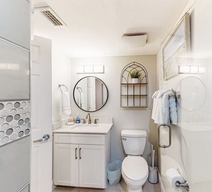 ?? "Style and Comfort Combined. The guest bath features a sleek walk-in tile shower, modern sink, and convenient seating—designed to make every moment at After Dune Delight feel luxurious." ???