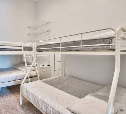 Bunk area with two twin-over-full bunk beds