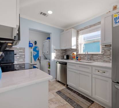 Updated Kitchen with quartz counters and stainless appliances