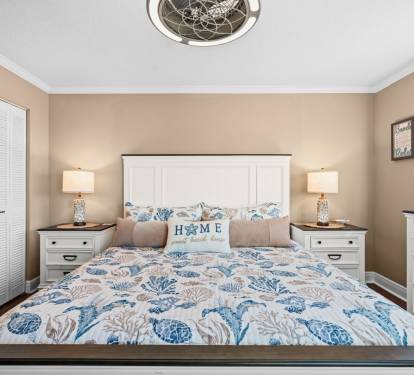 Master bedroom has a king bed, smart TV and ample clothing storage