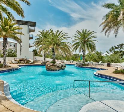 Resort-Style Heated* Lagoon Pool · Waterfall, Hot Tub & Fire Pit Included