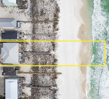 Direct ocean access and view of the 4-unit building from above. 