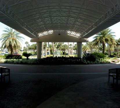 Large covered portico for lading and unloading.
