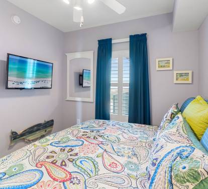 Another bedroom view showing comfy beds & space to settle in.