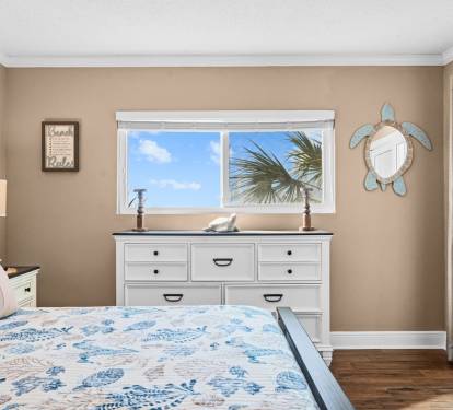 Master bedroom has a king bed, smart TV and ample clothing storage
