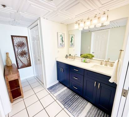 Updated dual vanity counter tops, with cabinets and drawers