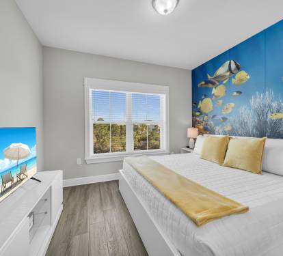 The underwater view of bedroom 3 from the full wall mural will have you dreaming of the ocean.  This room also features it's own arcade system with 50 games including PacMan and Centipede.  It's a kid's own getaway with its ensuite bathroom as well.