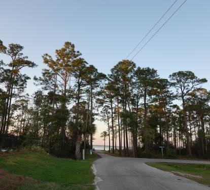 Walkable access to a private Wolf bay within the community for peaceful waterfront views