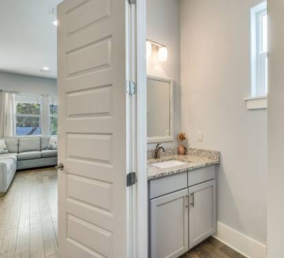 Convenient downstairs half bath located just off the main living area.
