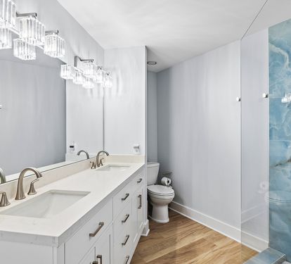 Master bathroom with a walk-in shower and double vanity