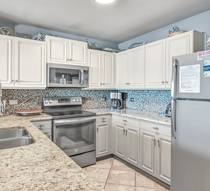 Fully stocked kitchen with new slate appliances...