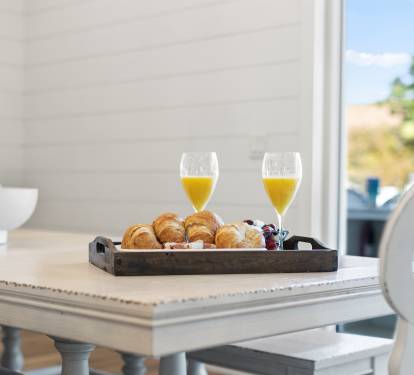 Dining room has great views that overlook the pool, hot tub and backyard