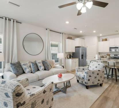Main living: an open living space designed for connection, flowing seamlessly into the dining area.