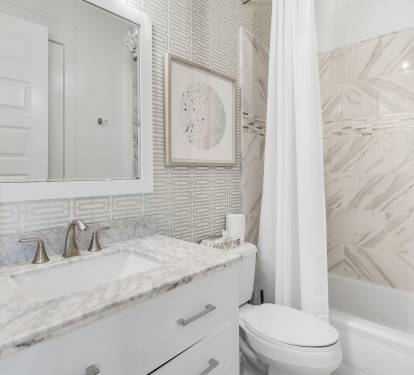 Main floor bathroom with 2 entrances off of #3 bedroom and the main floorhallway