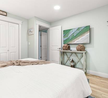 Guest Room with Cal King Bed and 55" Smart TV