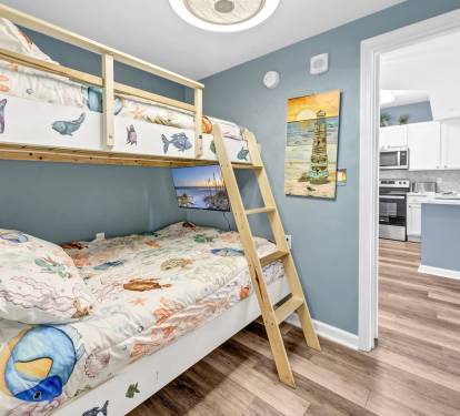 Fun bunk room w/ ocean-themed bedding, perfect for kids or extra guests