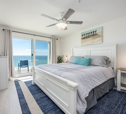 "Wake up to breathtaking Gulf views in the serene master bedroom, featuring a king bed and direct access to the private balcony. ???? #BeachfrontRetreat #OceanView"