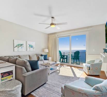 The sectional sofa, two captains chairs and two poufs (next to the console table) provide plenty of seating for hanging out in the living room.