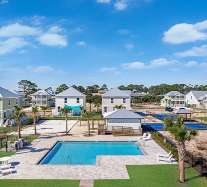 Community pool, volleyball, and pickleball courts!